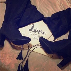 Thigh high black heel boots